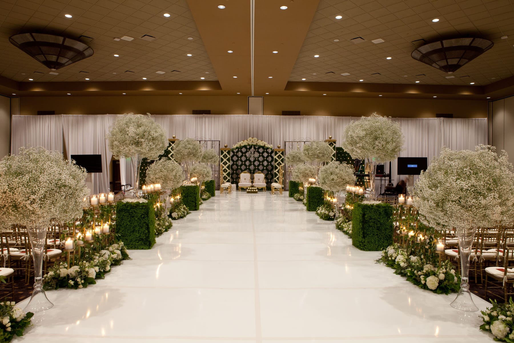 A ballroom at the Kalahari dressed in white and green